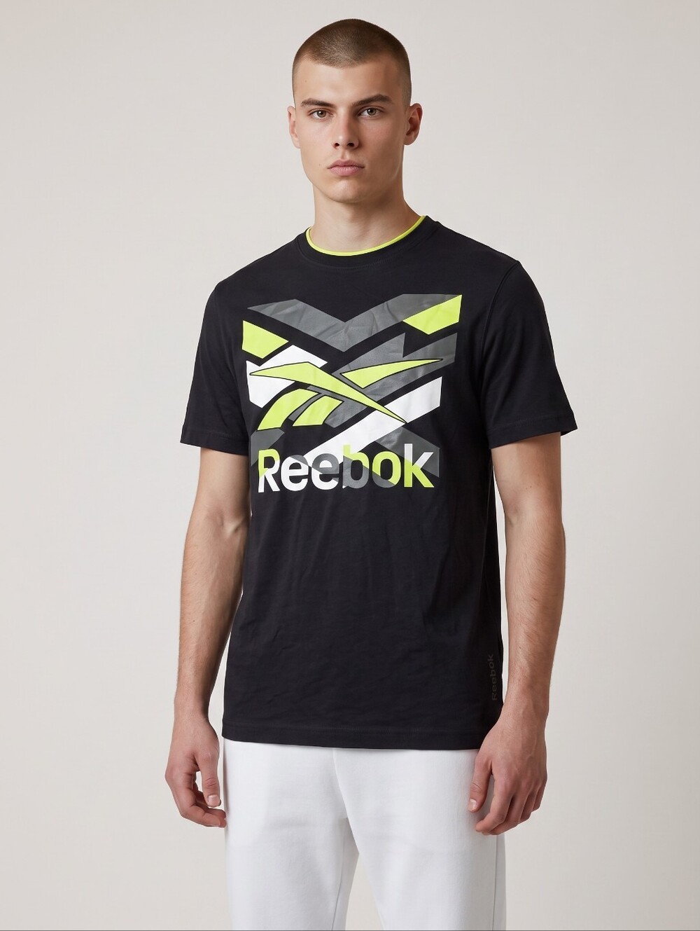 Reebok Black Short-Sleeve Graphic Logo Tee with Neon Yellow-Green Accents
